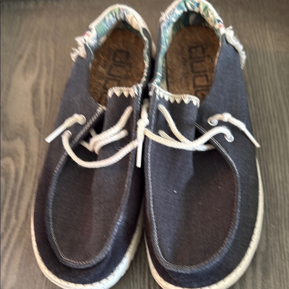 Hey Dude. Mens size 9 worn once. My husband wears size 8-8 1/2.